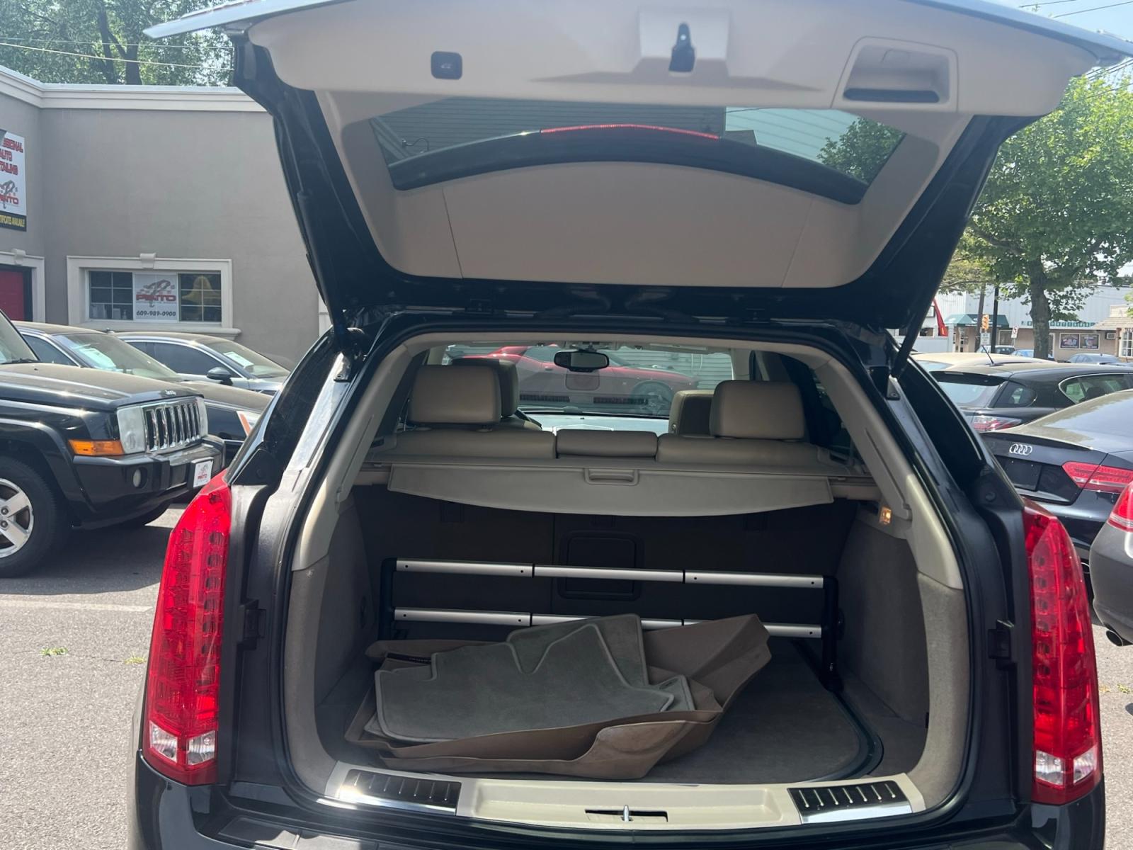 2013 BLACK /Beige leather Cadillac SRX (3GYFNGE37DS) , located at 1018 Brunswick Ave, Trenton, NJ, 08638, (609) 989-0900, 40.240086, -74.748085 - Can you say "Brand New" because that is exactly what this vehicle is.. Brand new in every way with only 29k Miles on it!! A must see in every way! - Photo #7